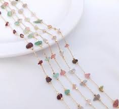 Permanent jewelry featuring stunning Emeralds and Sapphires